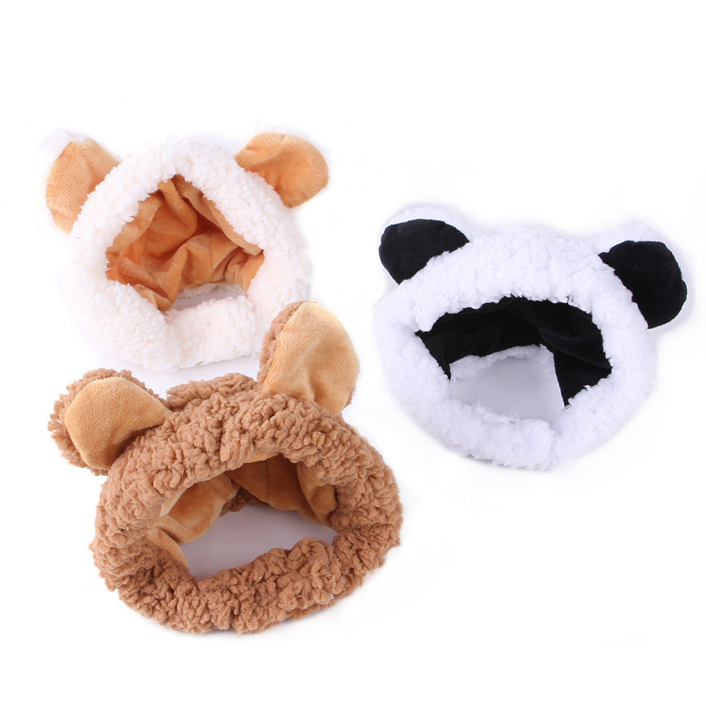 Two plush hair scrunchies, one brown and one white with black accents, on a white background.