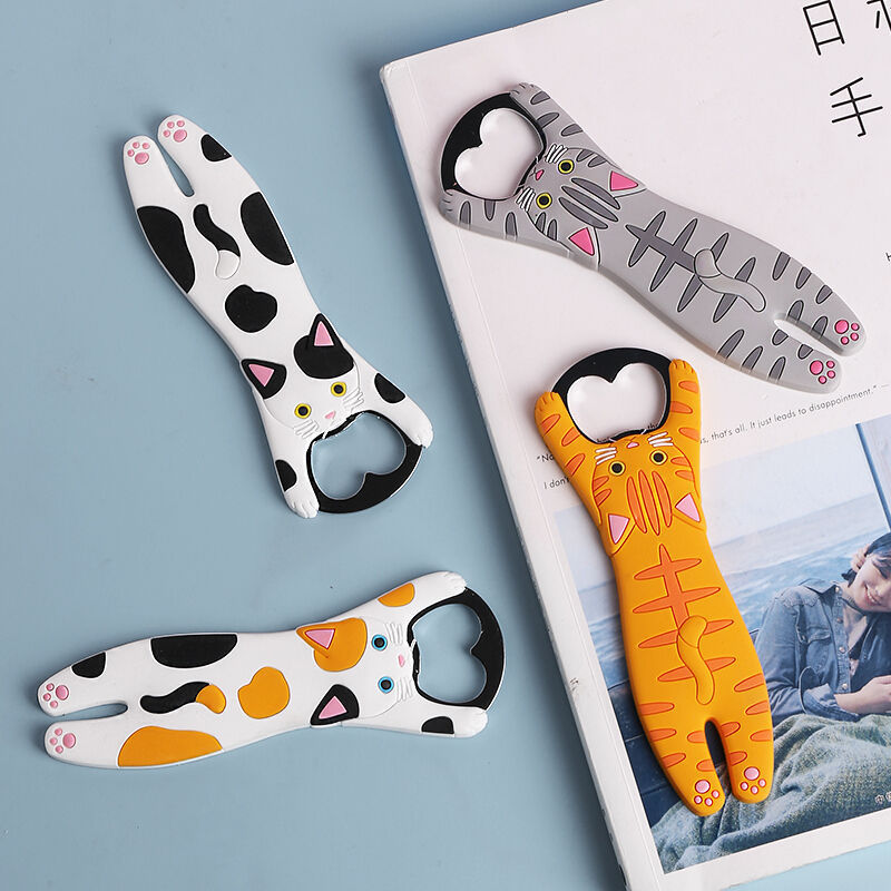 Four cat-shaped bottle openers with different designs - Neferpaws