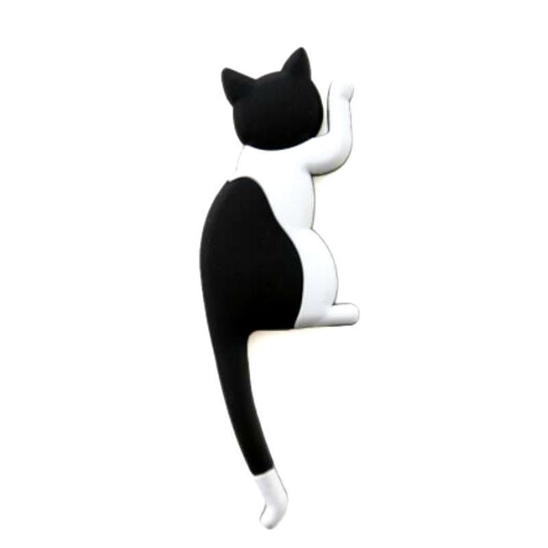 Black and white cat-shaped object on a white background