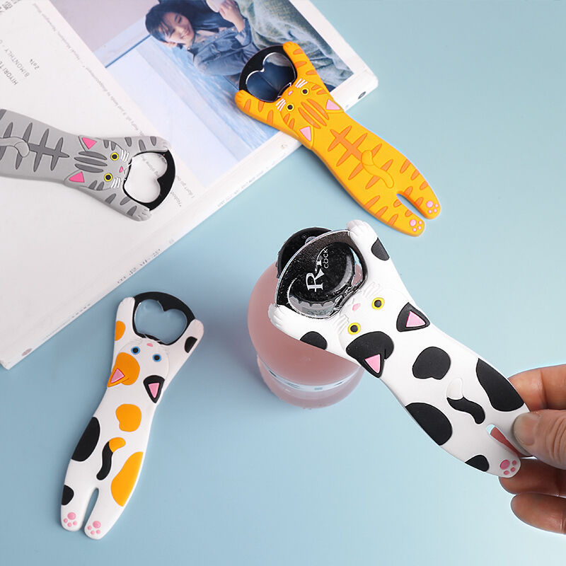 Cartoon-style bottle openers on a light blue surface - Neferpaws