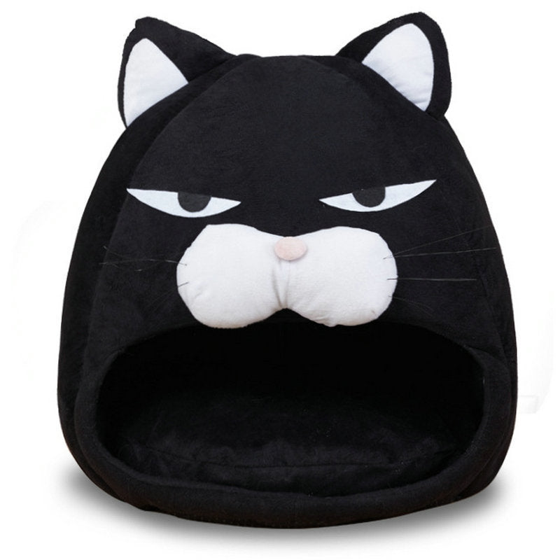 Black cat-shaped pet bed with white accents on a white background