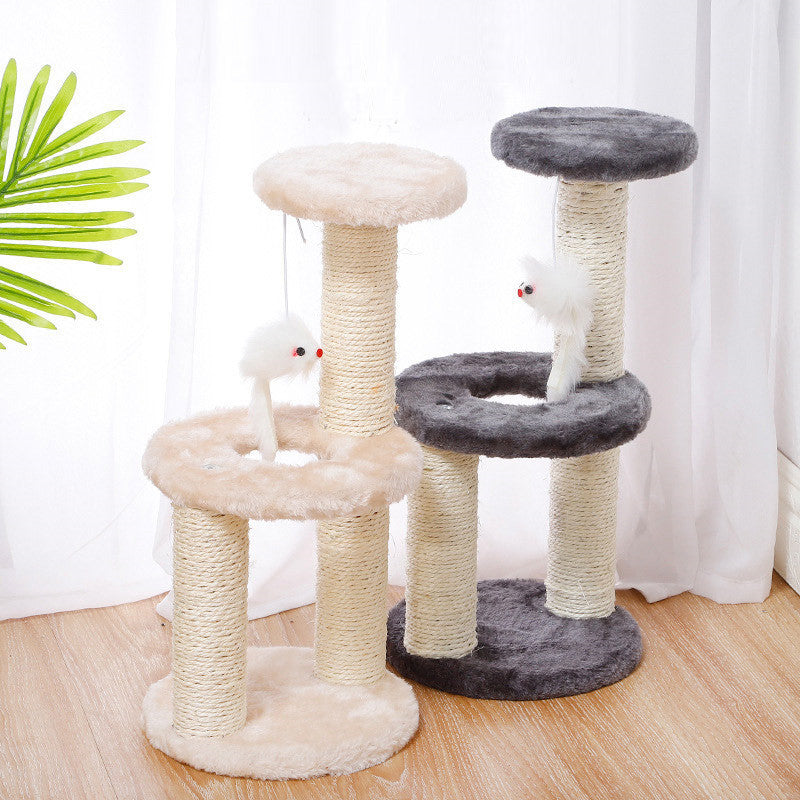Cat tree with multiple levels and a hanging toy on a wooden floor.