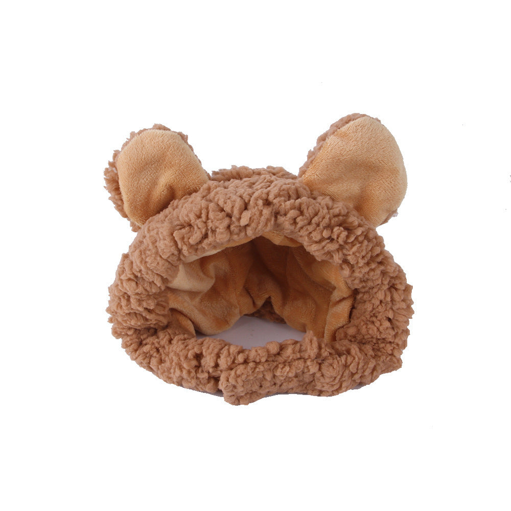 Brown fuzzy headband for cats with bear ears on a white background