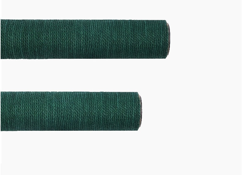 Two rolls of green fabric on a white background