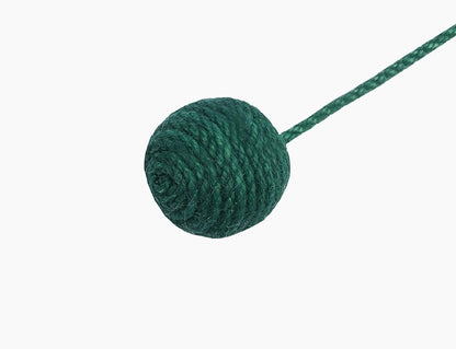 Green yarn ball on a white background