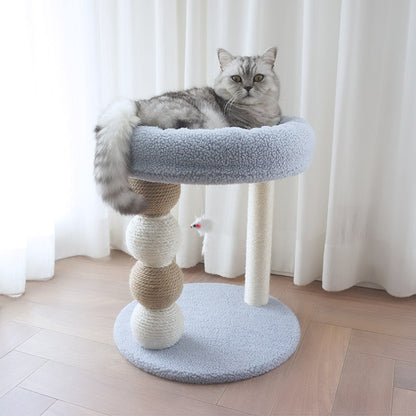 Cat lounging on a multi-level cat tree - Neferpaws