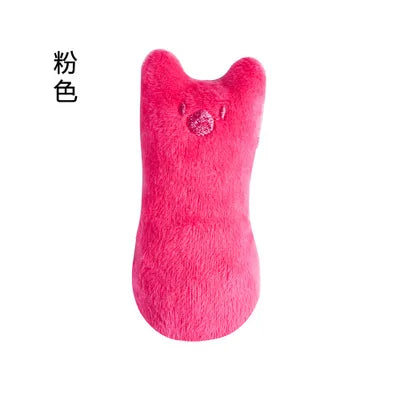 Pink plush toy with a heart on a white background