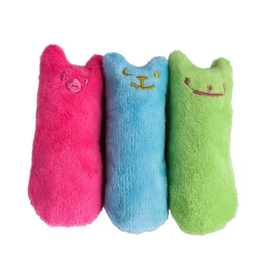 Three colorful plush toys shaped like cats 