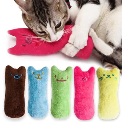 Cat playing with a pink toy, with five colorful cat-shaped toys - Neferpaws