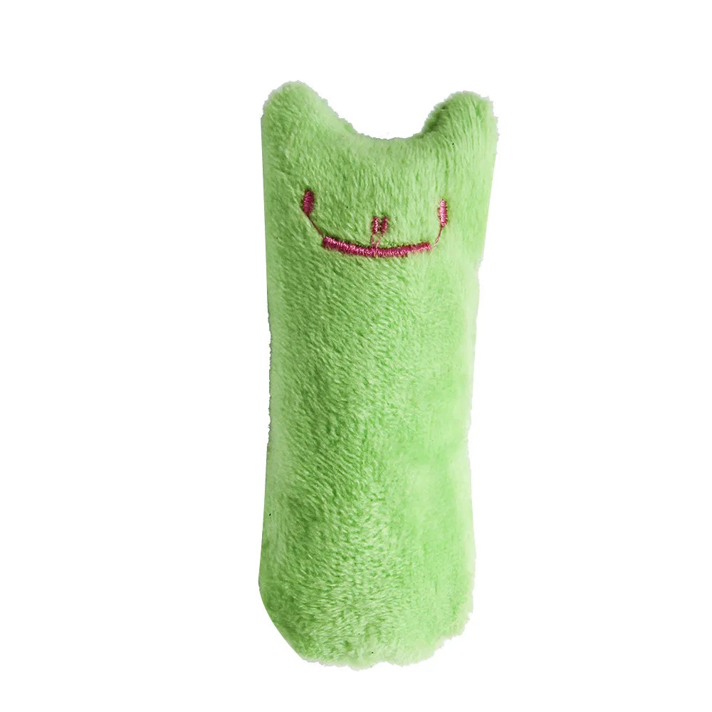 Green cat plush toy with a smiley face 