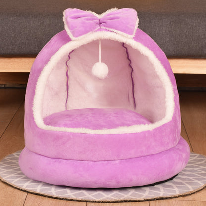 Purple cat bed with a bow and pom-pom on a wooden floor - Neferpaws