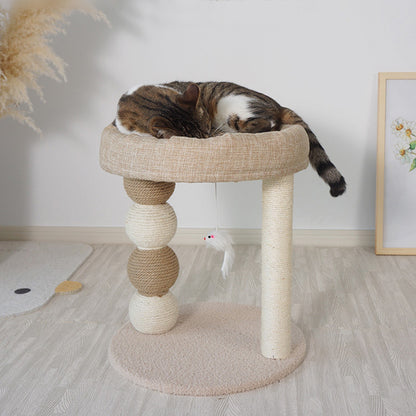 Cat sleeping on a multi-colored cat tree in a room with a light gray wall and wooden floor - Neferpaws