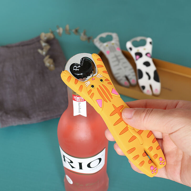 A yellow tiger-shaped cat bottle opener 