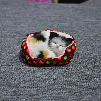 Will the small cat sleeping in a little bed toy